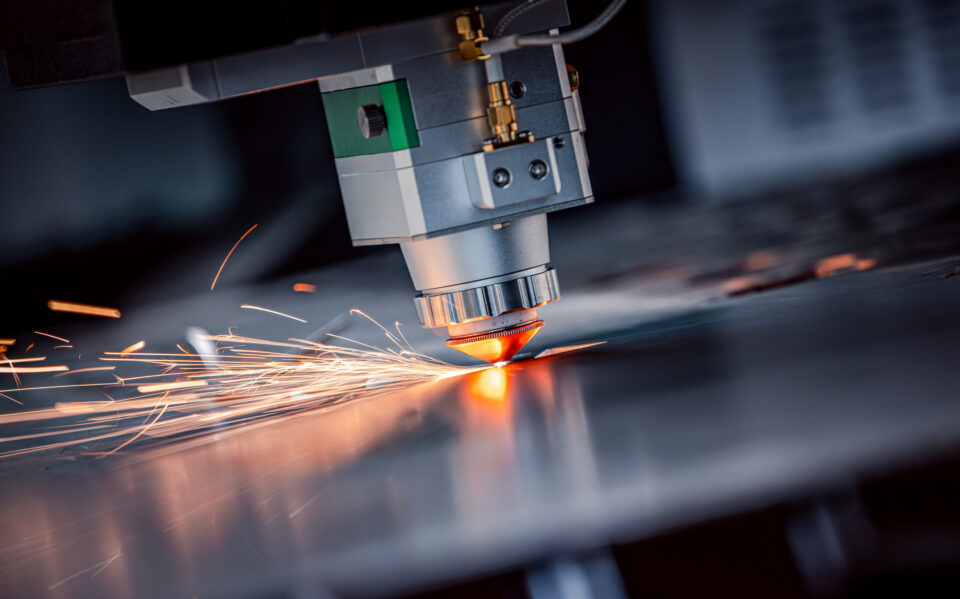 CNC Laser cutting of metal, modern industrial technology Making Industrial Details. The laser optics and CNC (computer numerical control) are used to direct the material or the laser beam generated.